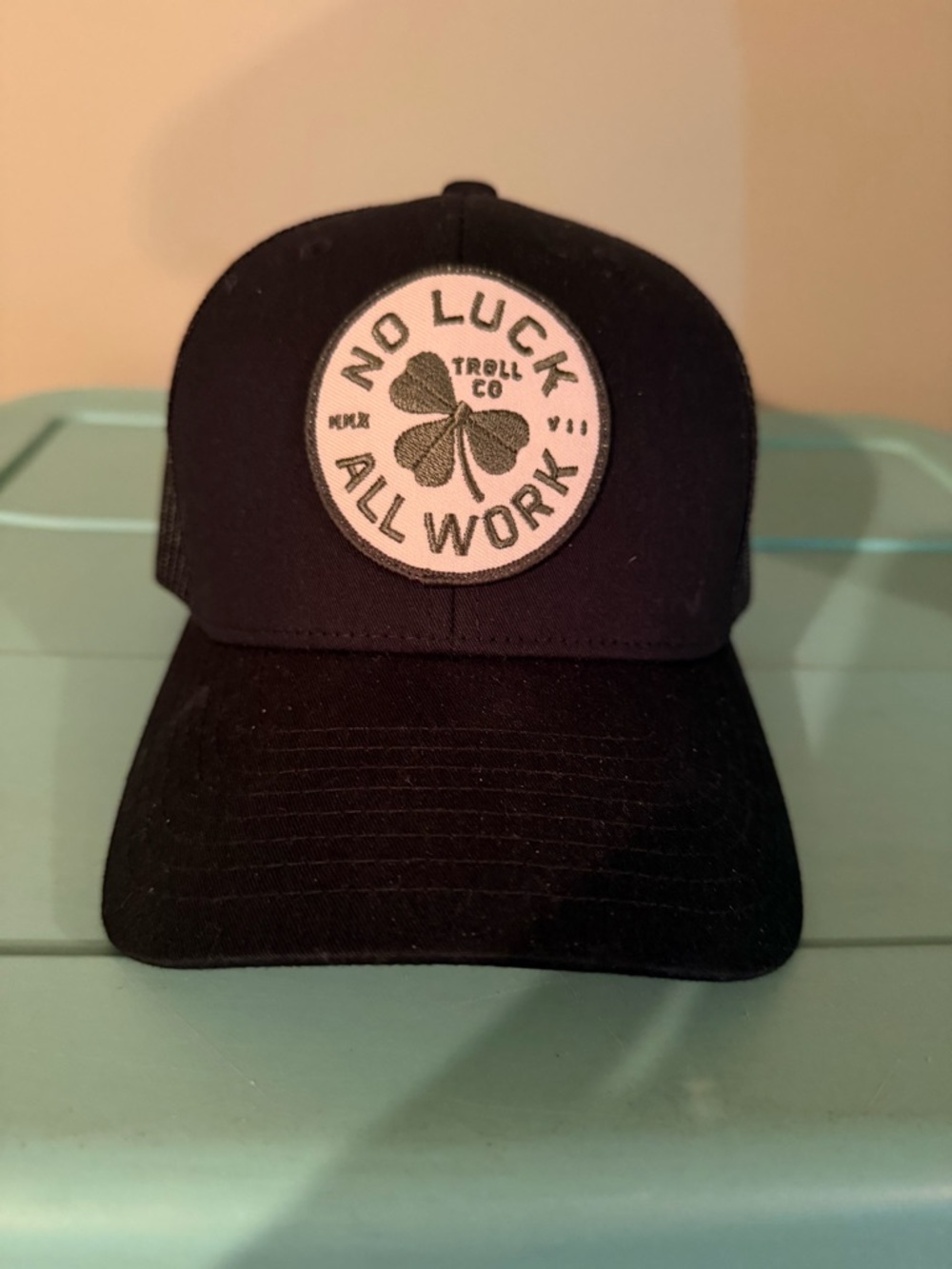 Troll brand NOLAW BROKEN CLOVER CURVED BRIM TRUCKER HAT